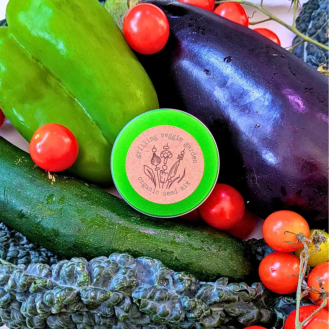 Organic Grilling Veggie Garden Seed Mix tin with green Plantflix peppers, cucumber and eggplant on Tampa Home & Garden Store