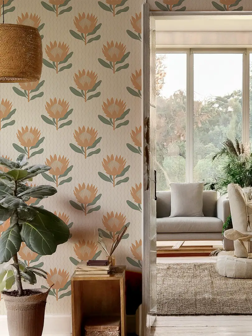 King Protea Wallpaper by Samantha Santana Creative in neutral apricot on a living room wall on Tampa Home & Garden Store