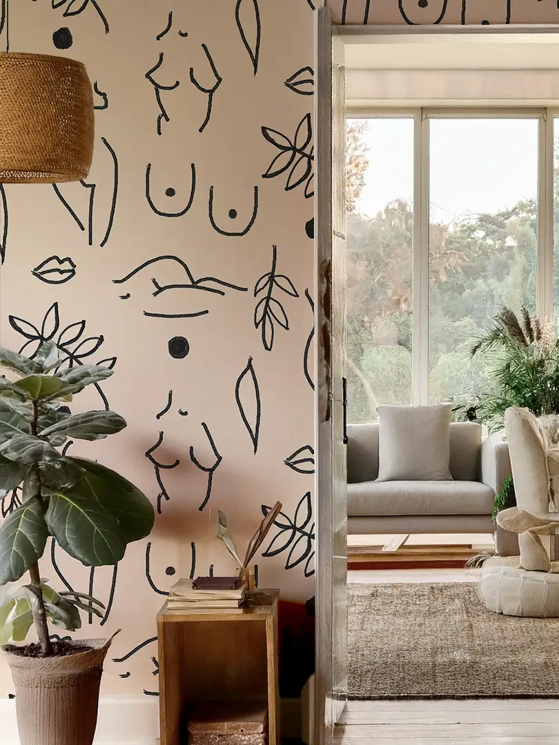 Neutral Nudes Wallpaper with black minimalist nude line art and leaves on a soft pink backdrop on Tampa Home & Garden Store