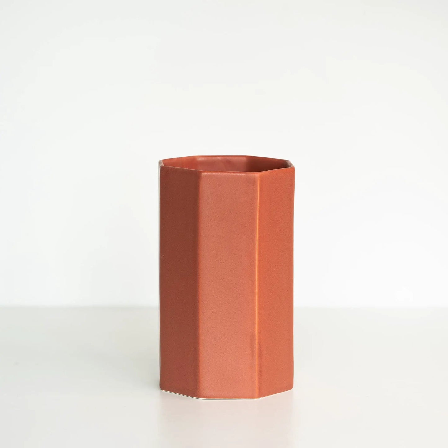 Handmade porcelain bouquet vase in warm orange rectangular shape with squared edges on Tampa Home & Garden Store