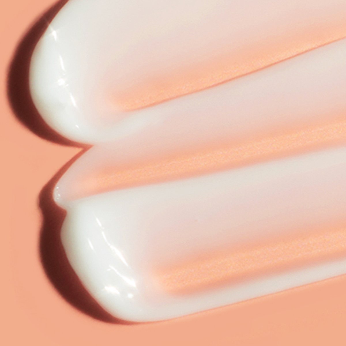haruharu wonder Centella 5% Niacinamide Radiance Gel Cream two swatches on peach background on Tampa Home & Garden Store