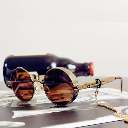 Stevvex round metal-frame sunglasses with brown gradient lenses and gold-tone chain on Tampa Home & Garden Store