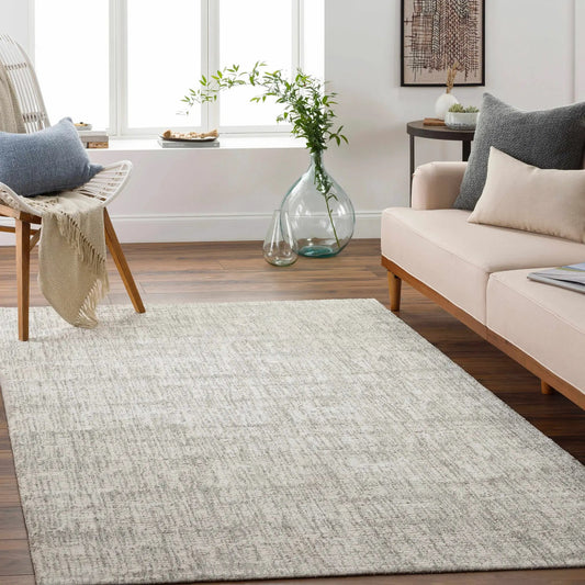 Hollywell Luxe Rug cream and charcoal by Boutique Rugs in a bright living room setting on Tampa Home & Garden Store