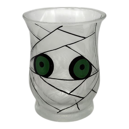 Whimsical Halloween Glass Candle Holder with green-eyed pumpkin face, clear glass on Tampa Home & Garden Store