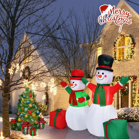 Two 6-foot inflatable snowmen with top hats and green scarves, festive gifts and lights on Tampa Home & Garden Store