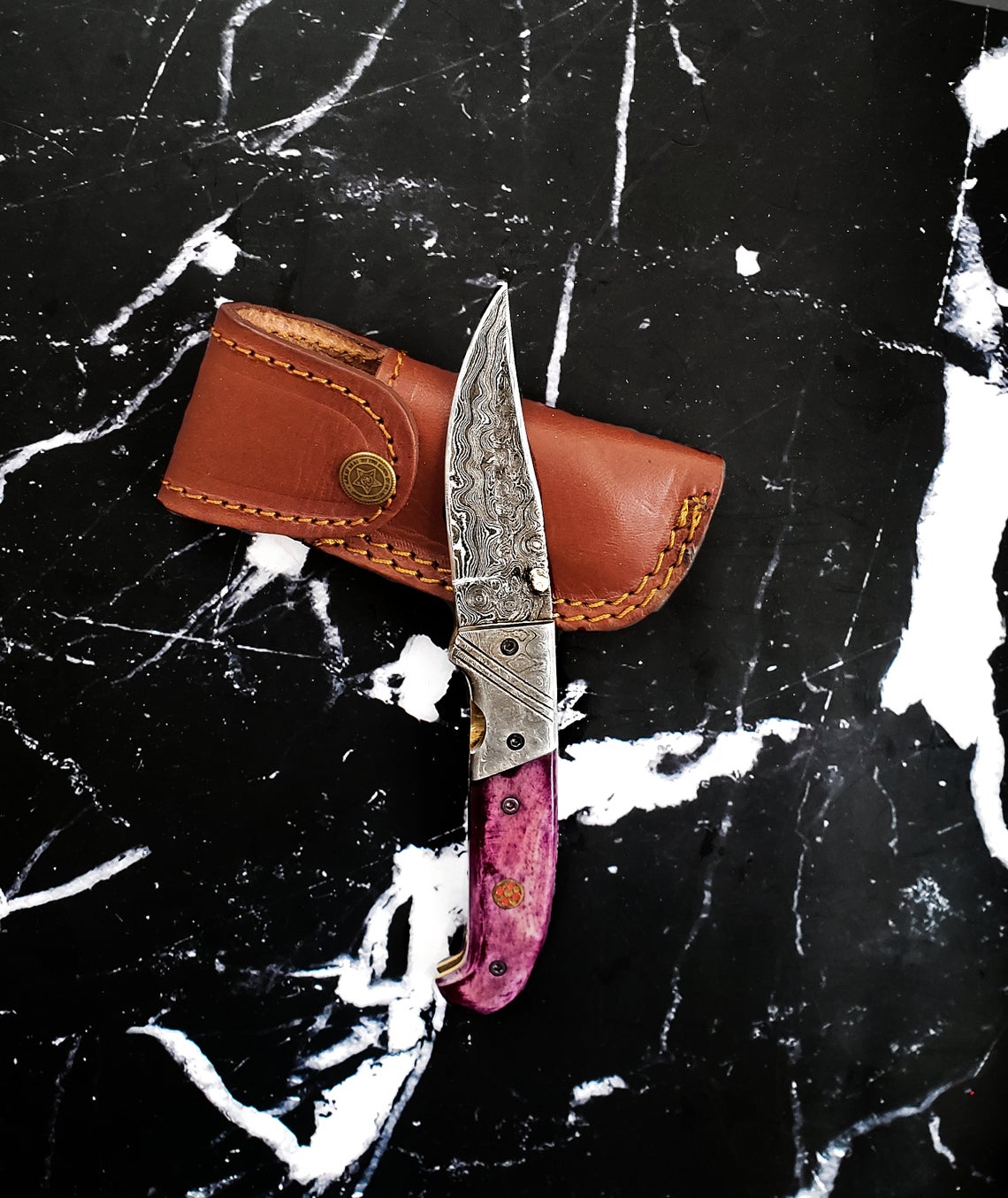 Titan Classico Viola folding knife with raindrop Damascus blade, purple handle, EDC clip point on Tampa Home & Garden Store