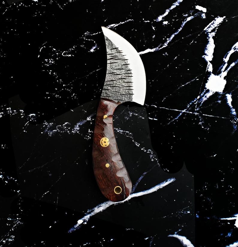 Titan hand-forged ulu-inspired EDC knife with wood handle and brass pins on black marble on Tampa Home & Garden Store