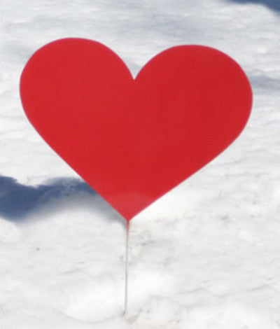 Red metal heart garden stake by Rustica Ornamentals on snowy ground on Tampa Home & Garden Store