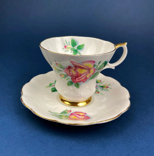 Vintage Royal Albert Roses Cup and Saucer on fine bone china with pink roses and gold trim on Tampa Home & Garden Store