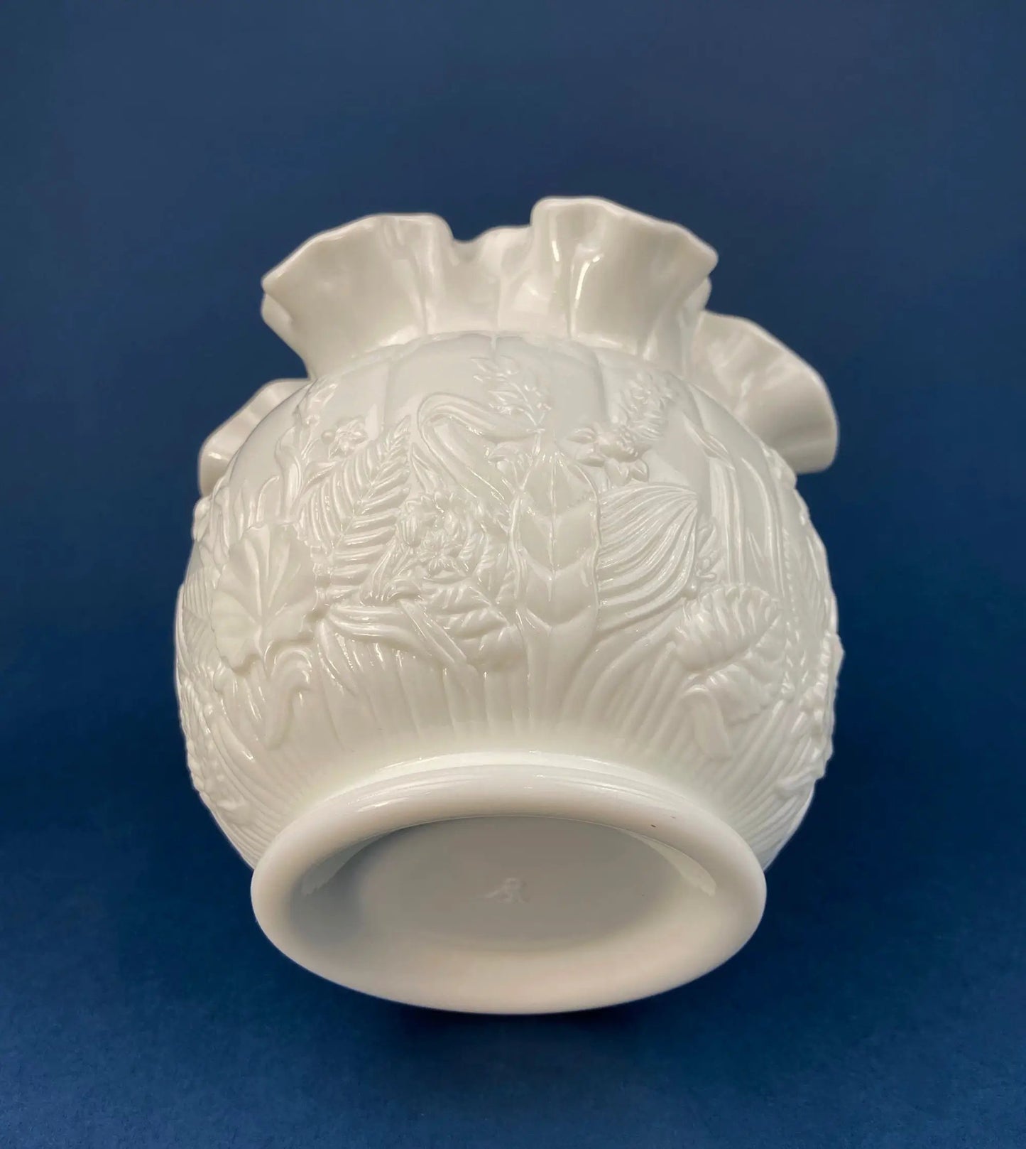 Small white milk glass vase with a ruffled edge and embossed floral pattern on Tampa Home & Garden Store