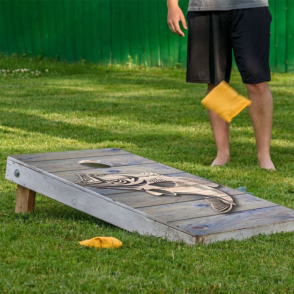 Bass Fish Jump Cornhole Board Wrap Set of 2 featuring bass graphic on weathered wood on Tampa Home & Garden Store