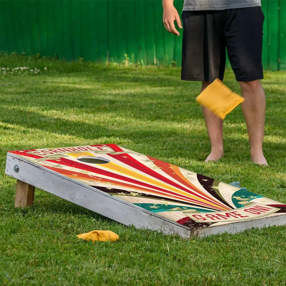 Circus Stripes Cornhole Board Wraps, set of 2 with bold red, orange, yellow and teal stripes on a whitewashed board on Tampa Home & Garden Store