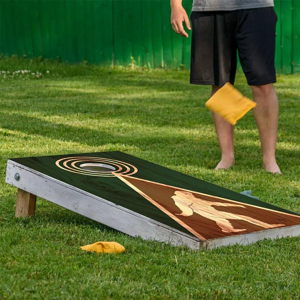 Legend Bigfoot cornhole wrap set of 2 with Bigfoot silhouette on green panel on Tampa Home & Garden Store