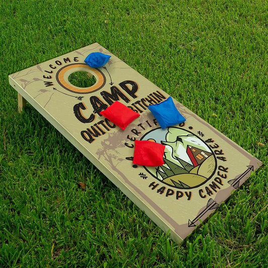 Camp Quitcherbitchin Cornhole Board Wrap Set of 2 with 4 red and blue bean bags on camo boards on Tampa Home & Garden Store