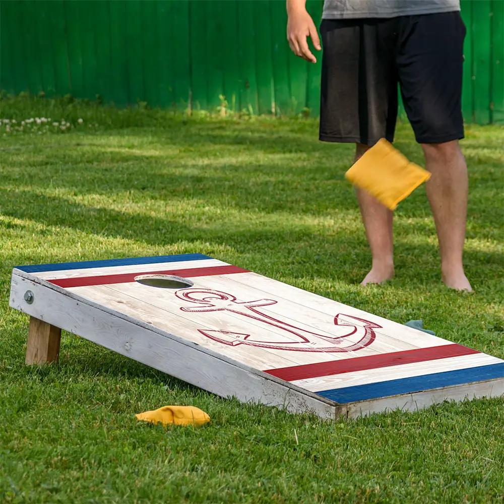 Nautical Cornhole Board Wraps Set of 2 on wood with red anchor artwork and blue trim on Tampa Home & Garden Store