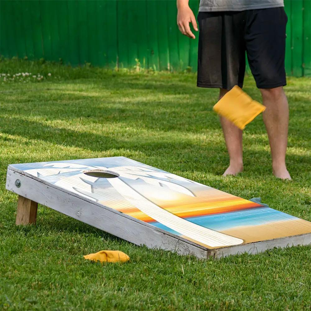 Palm on Beach Cornhole Board Wraps set of 2 with tropical sunset gradient on weathered boards on Tampa Home & Garden Store