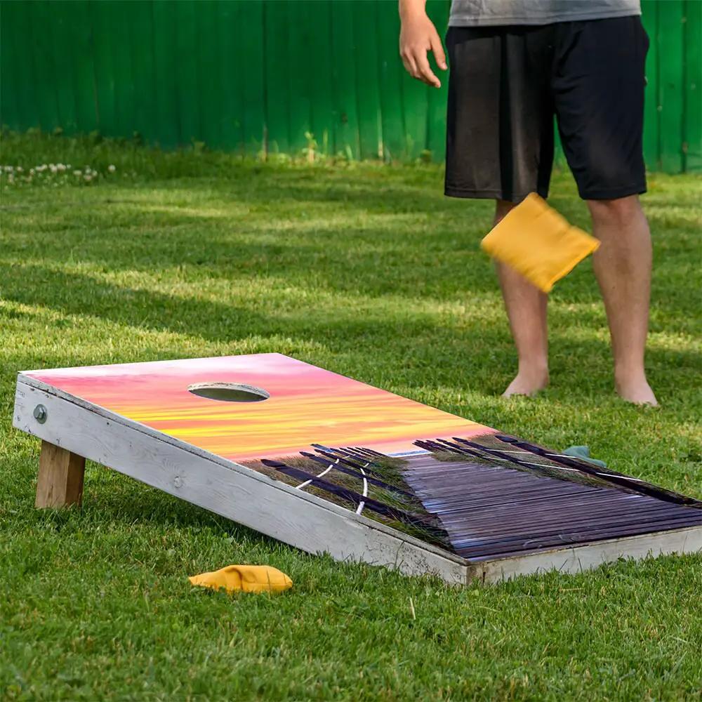 Pier at Sunrise Cornhole Board Wrap Set of 2 with sunset gradient design on Tampa Home & Garden Store