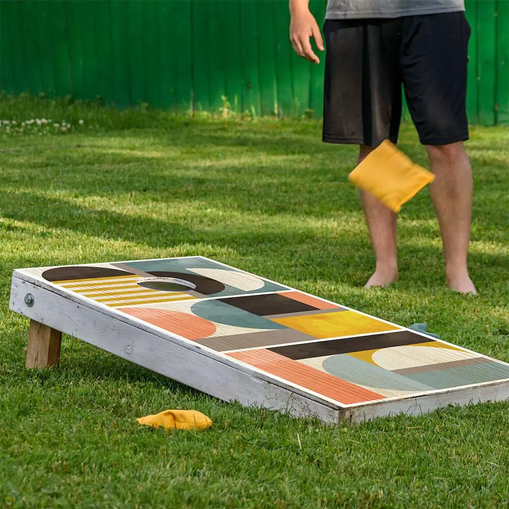 Cornhole board wraps set of 2 in a geometric abstract multicolor pattern by Lone Star Art on Tampa Home & Garden Store