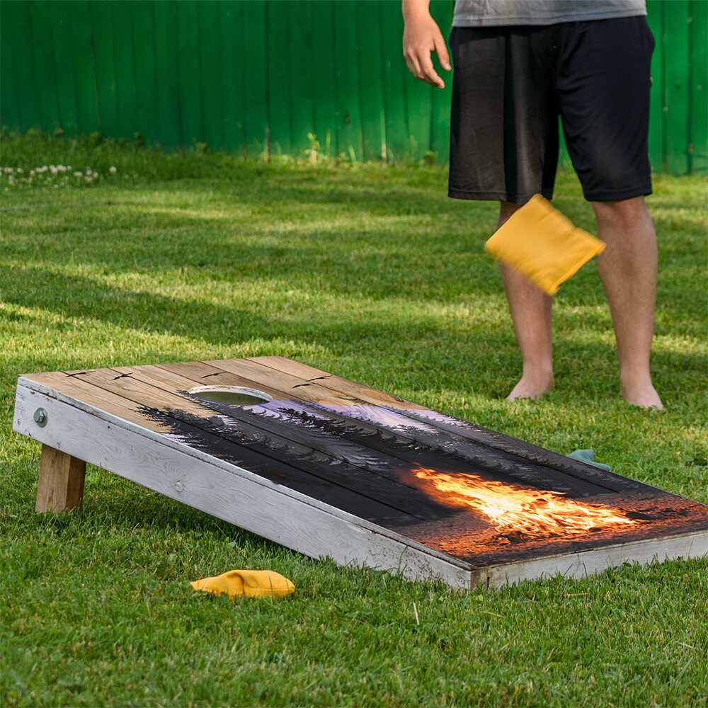 Campfire Cornhole Board Wraps set of 2 by Lone Star Art with flame graphic on boards on Tampa Home & Garden Store
