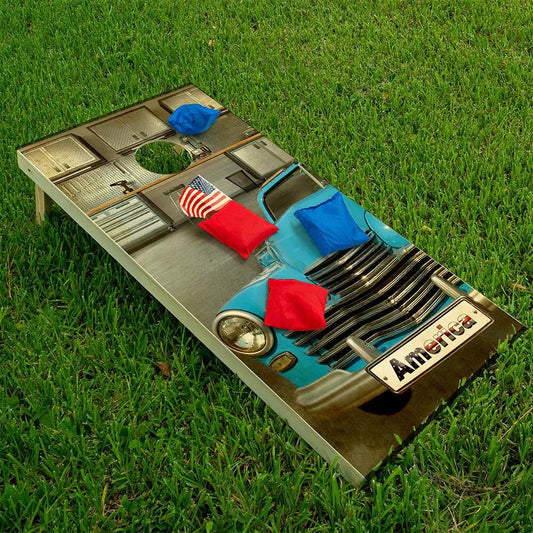 Blue car cornhole board wrap, set of 2, displayed on grass on Tampa Home & Garden Store