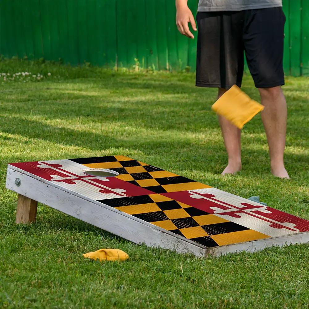 Cornhole board wrap set of 2 featuring Maryland flag with red black gold checker panels on boards on Tampa Home & Garden Store