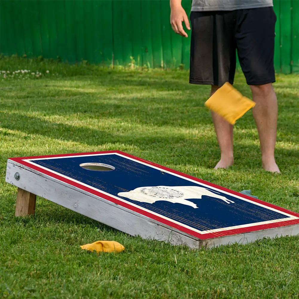 Wyoming cornhole board wrap set of 2 with blue surface, red border Lone Star Art on Tampa Home & Garden Store