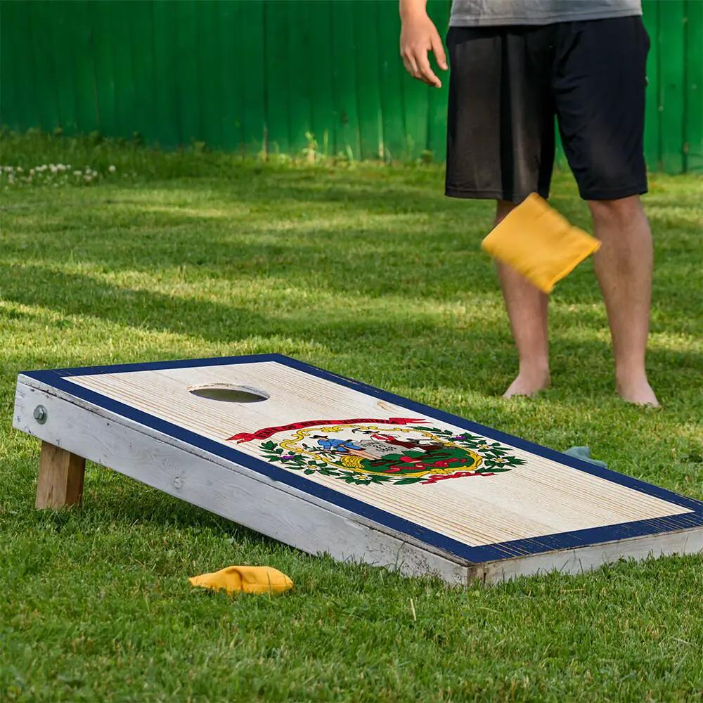 Cornhole wrap set of 2 featuring West Virginia state seal on pale wood boards with blue border on Tampa Home & Garden Store