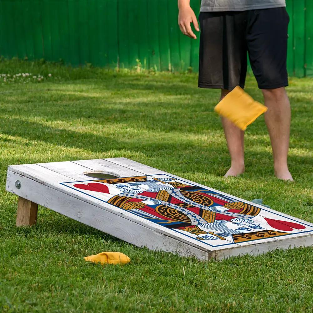 King and Queen of Hearts cornhole board wrap on white weathered board with playing-card art on Tampa Home & Garden Store