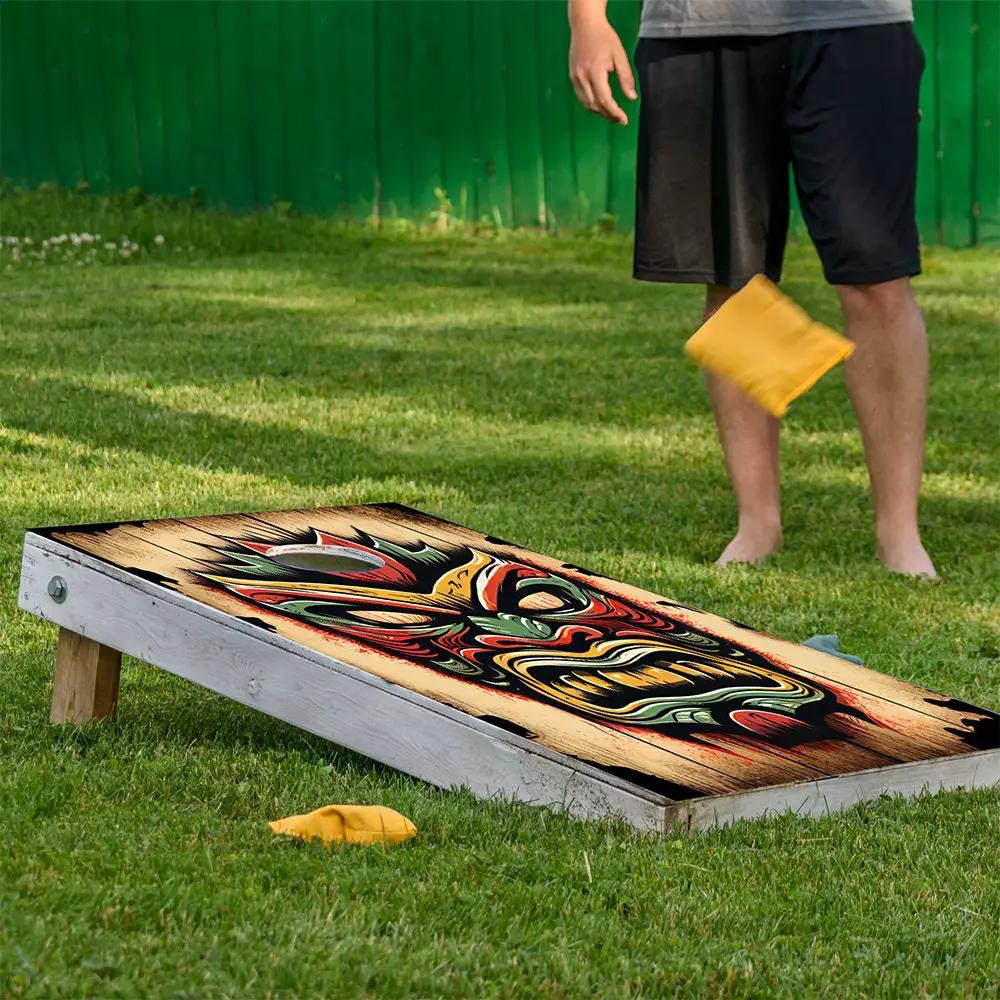 Cornhole board wrap with tropical tiki mask artwork in bold colors Lone Star Art on Tampa Home & Garden Store