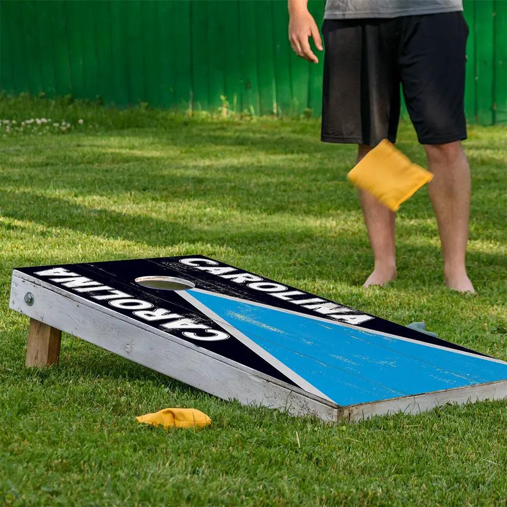 Carolina Football cornhole board wraps set of 2 with black background and blue diagonal stripe on Tampa Home & Garden Store