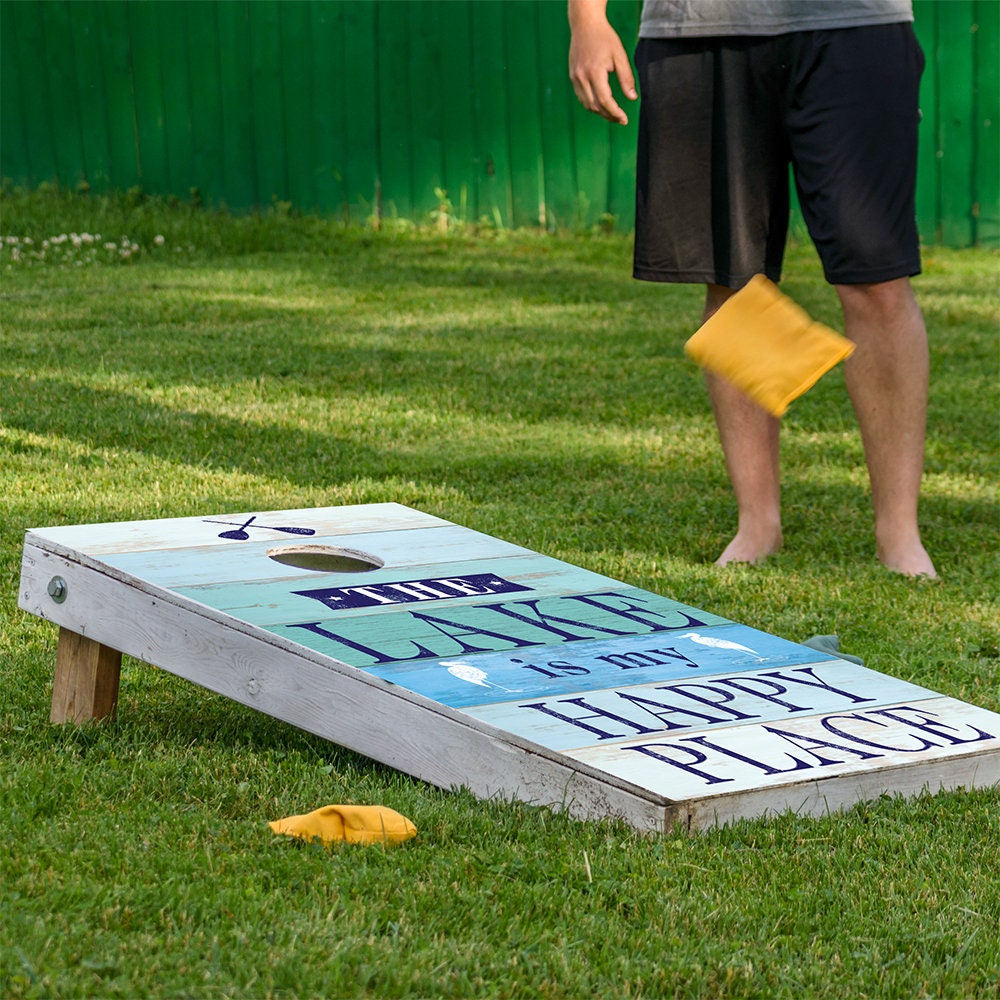 Cornhole wrap set of 2 The Lake Is My Happy Place by Lone Star Art on weathered blue planks on Tampa Home & Garden Store