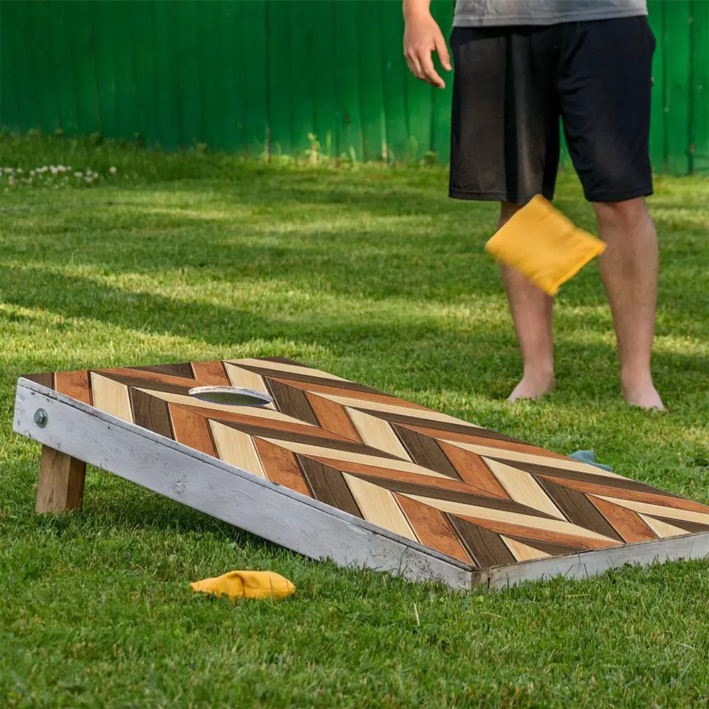 Wood Chevron Cornhole Board Wrap Set of 2 in mixed wood tones on Tampa Home & Garden Store