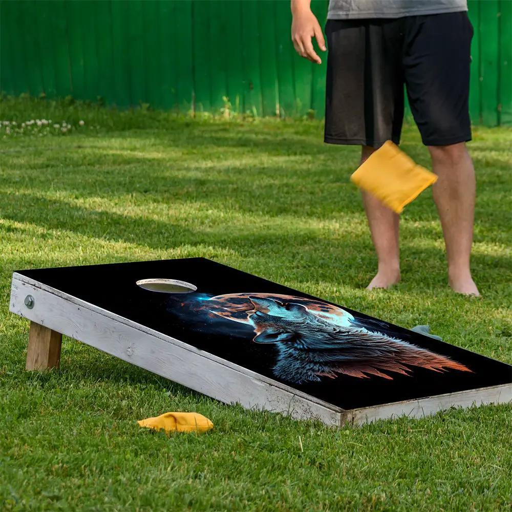 Howling Wolf Cornhole Wraps set of 2 with black background wolf art on wooden boards on Tampa Home & Garden Store