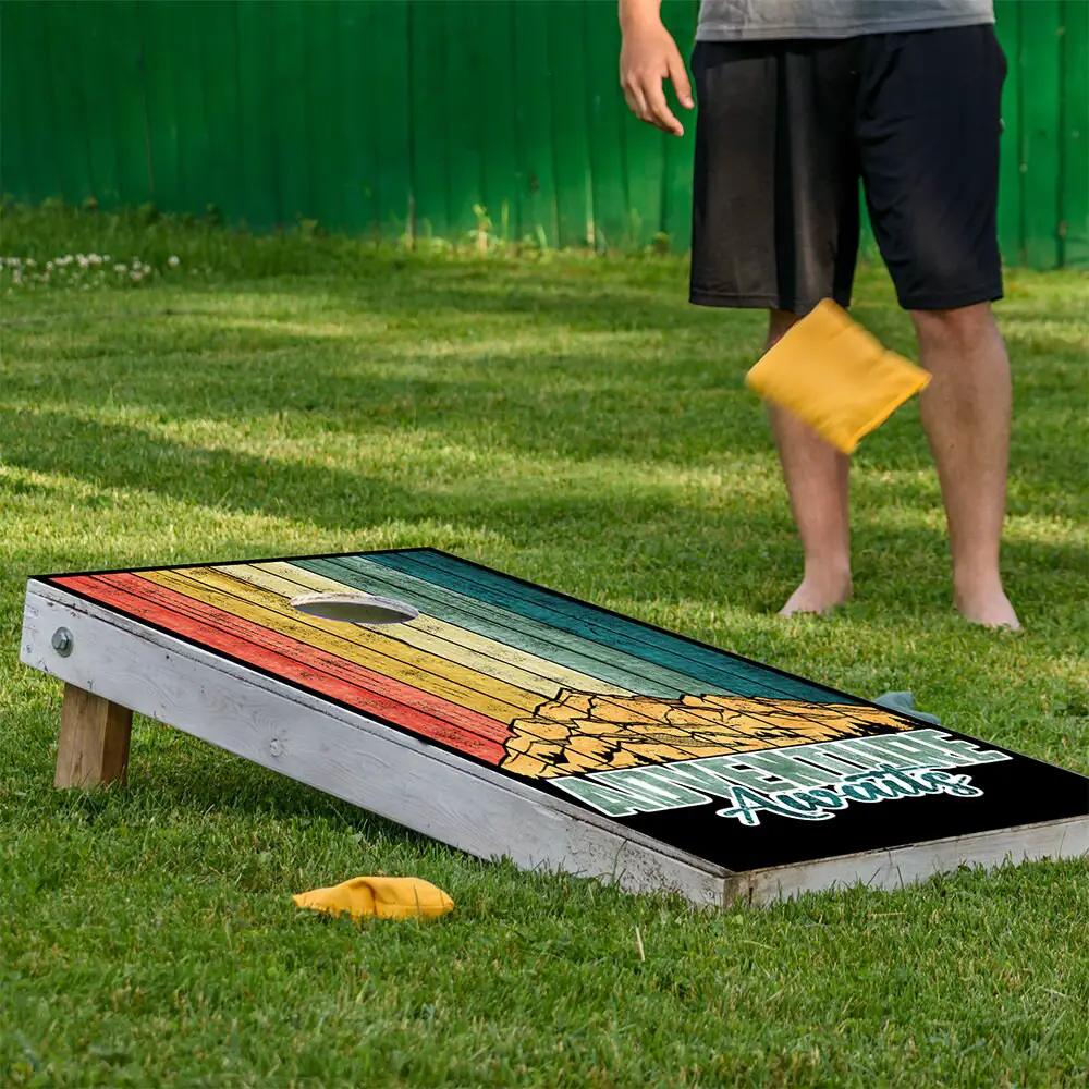 Cornhole board wrap set of 2 with rainbow plank print and Adventure Awaits by Lone Star Art on Tampa Home & Garden Store