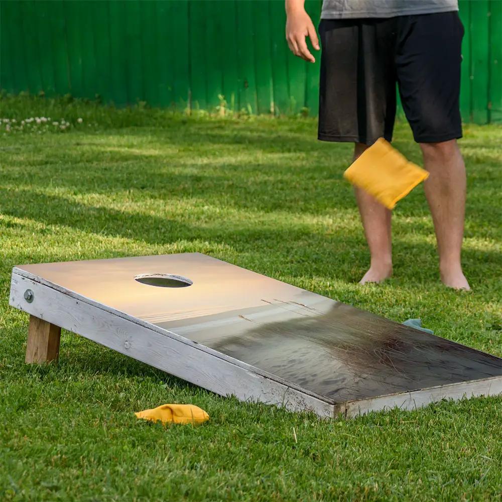 Beach Sand Dunes Cornhole Board Wrap Set 2, whitewashed boards with hole on grass on Tampa Home & Garden Store