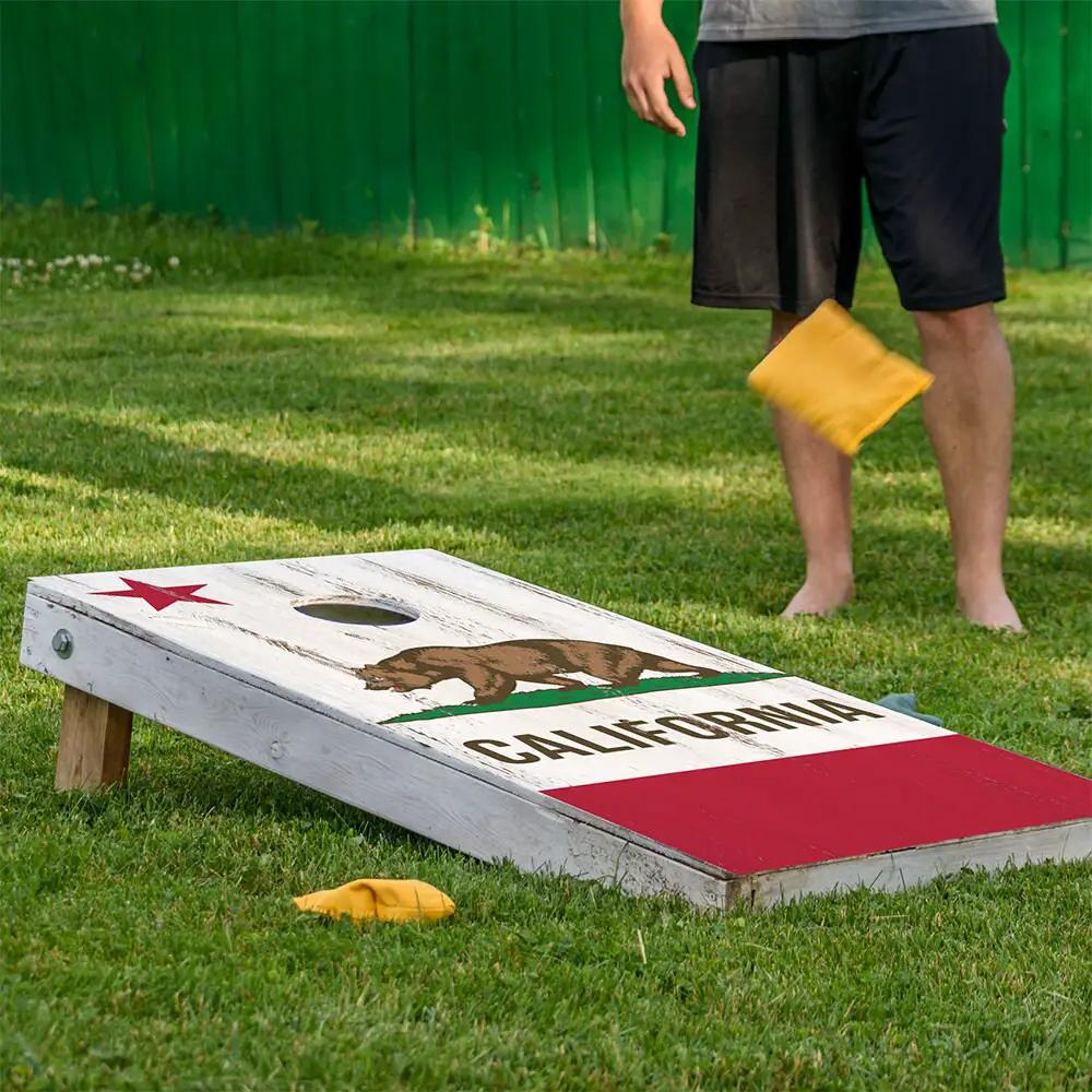 Cornhole board wrap California state flag design set of 2 on rustic white planks on Tampa Home & Garden Store
