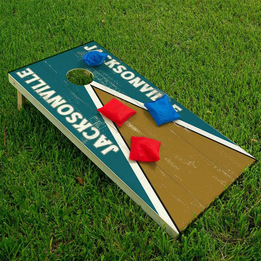 Cornhole wrap 2-pack Jacksonville Football teal brown with hole and red/blue bean bags on grass on Tampa Home & Garden Store