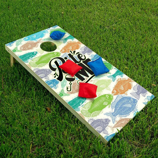 Cornhole wrap Bite Me Fishing, set of 2, fish print board with hole and red/blue bags on Tampa Home & Garden Store