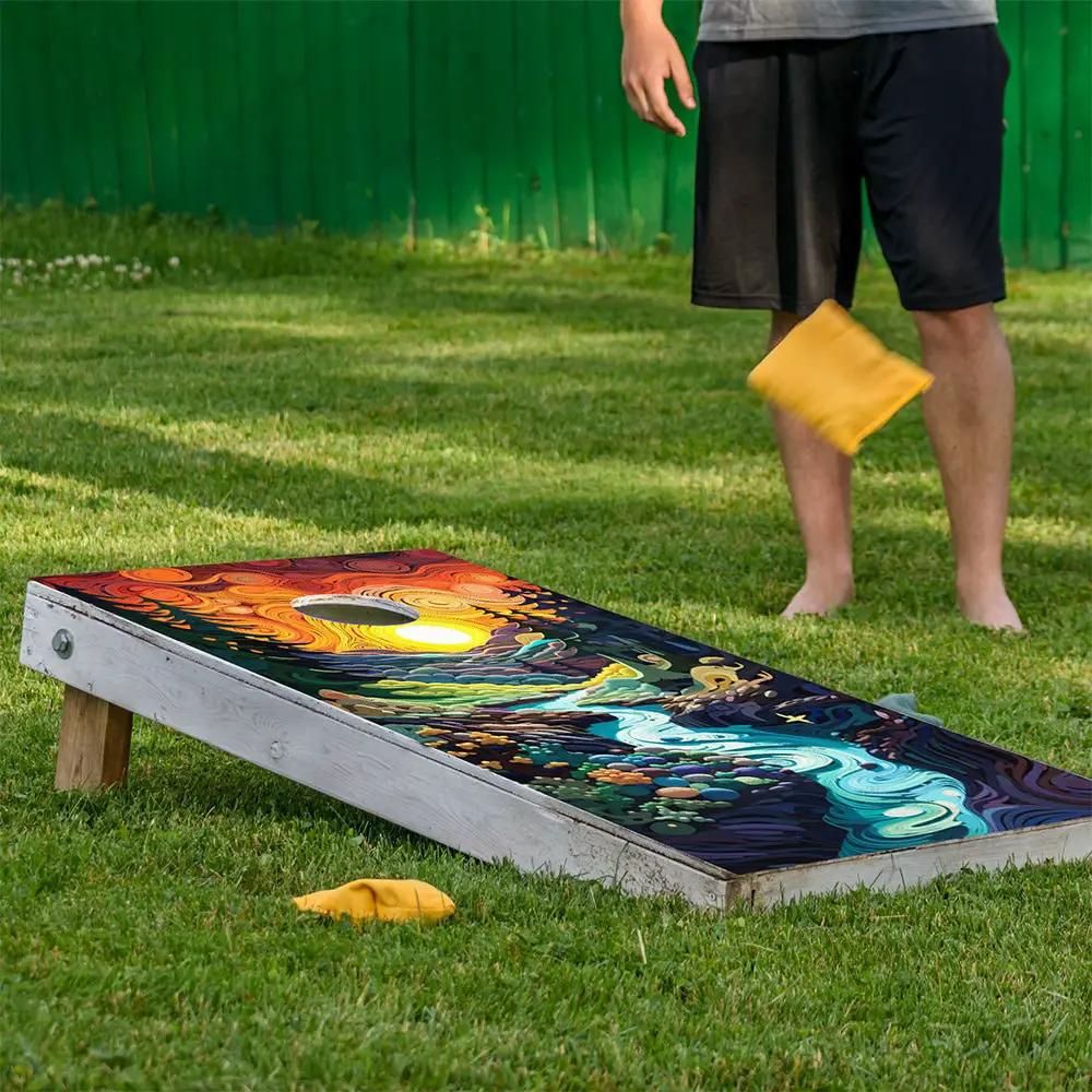Land of Dreams cornhole board wrap set of 2 with vibrant multicolor swirl design on wooden boards outdoors on Tampa Home & Garden Store