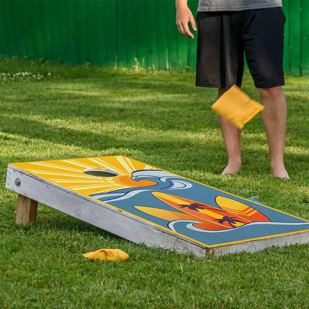 Surf the Wave cornhole board wrap set of 2 in yellow-blue palm design by Lone Star Art on Tampa Home & Garden Store