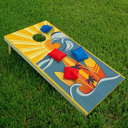 Surf the Wave Cornhole Board Wrap Set of 2 with sunny yellow, blue waves, and palm silhouette on Tampa Home & Garden Store