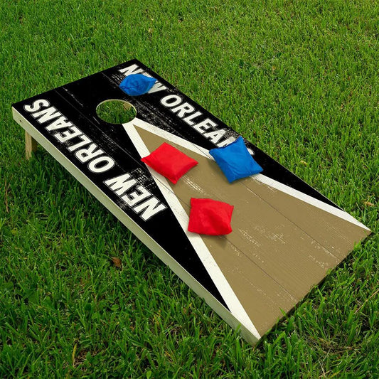 New Orleans Football Cornhole Wrap Set of 2 on black and tan board with bold white lettering and red/blue bean bags on Tampa Home & Garden Store
