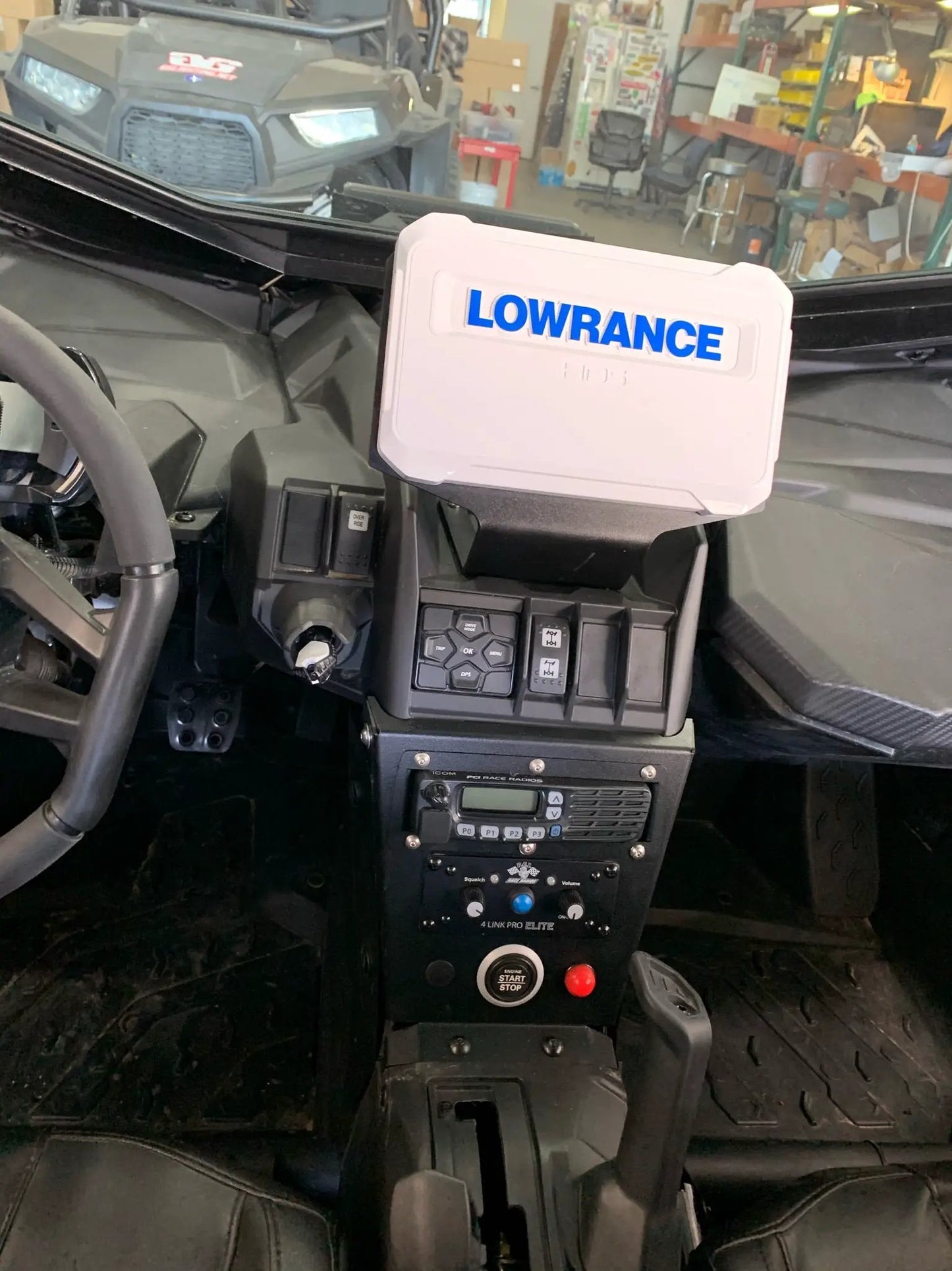 HDS Live GPS bracket for Can Am X3 Elite FS, white Lowrance unit mounted on the dash on Tampa Home & Garden Store