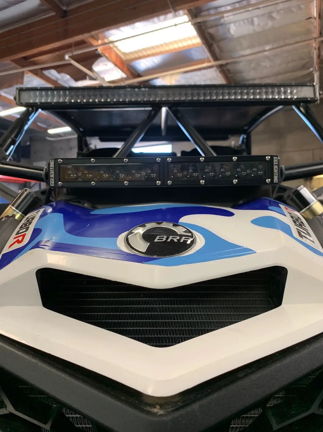 Can Am X3 12 LED Bar Mount Shock Tower vehicle mount by GGLighting with BRP badge visible on Tampa Home & Garden Store