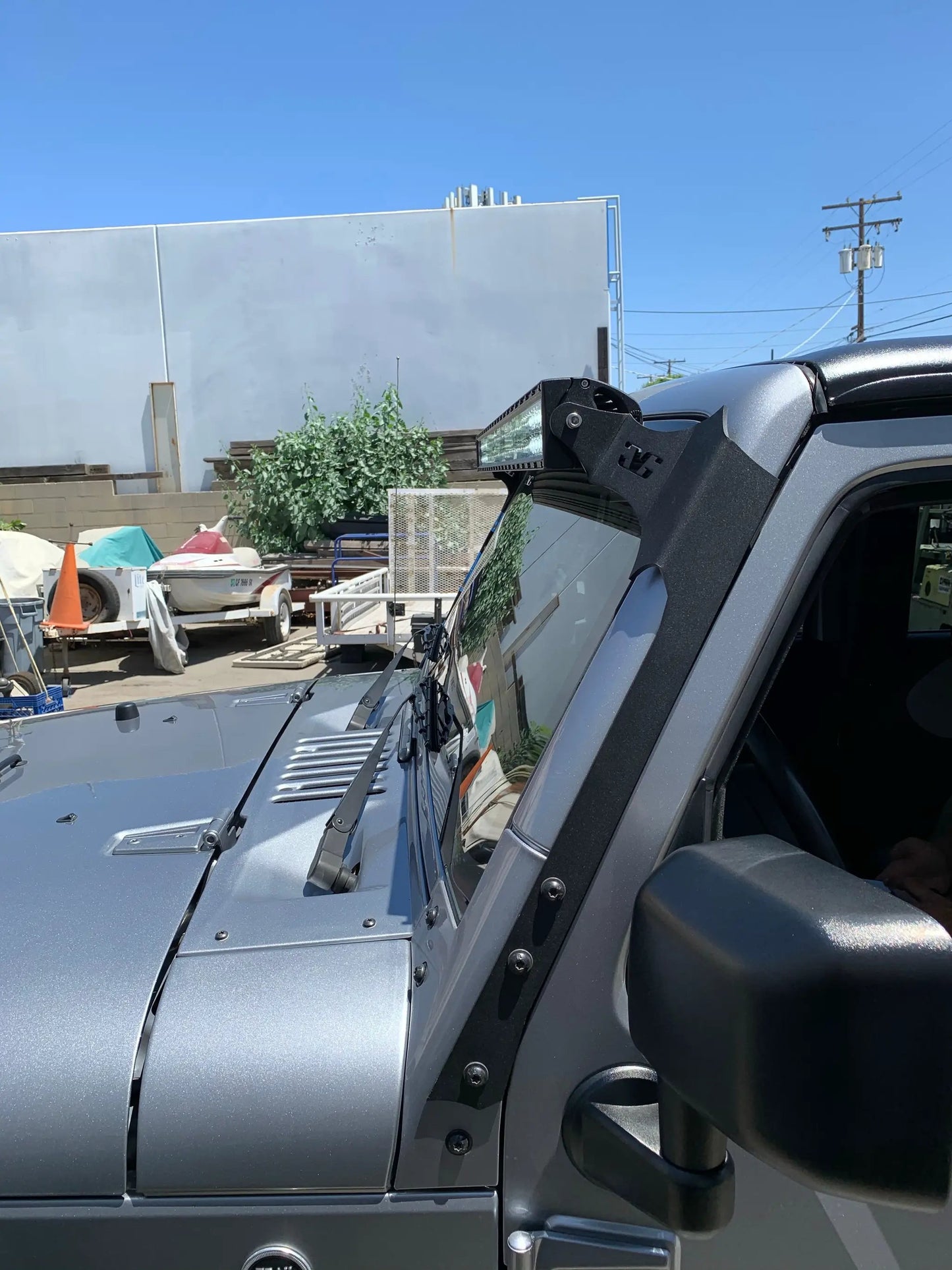 Jeep Wrangler JK 50in LED light bar roof mounts by GGLighting, black metal brackets on Tampa Home & Garden Store