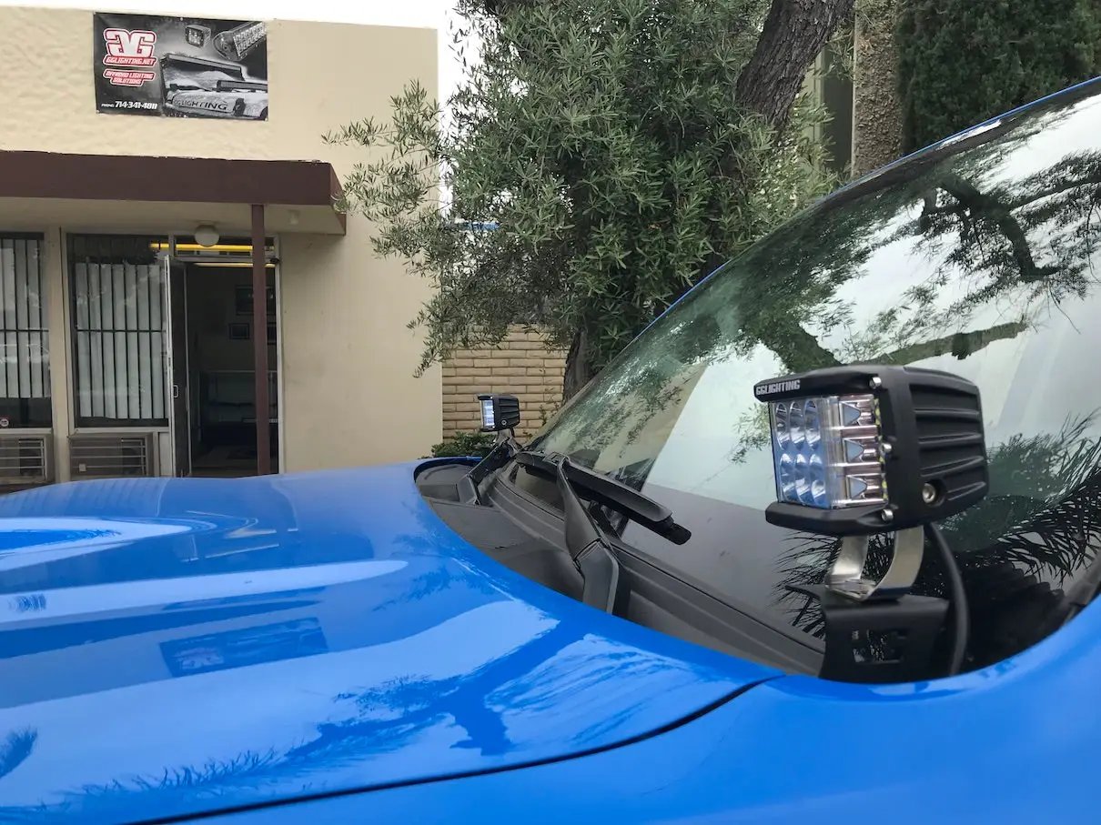 Toyota 4Runner ditch light brackets with black GGLighting LED lights on SUV by windshield on Tampa Home & Garden Store