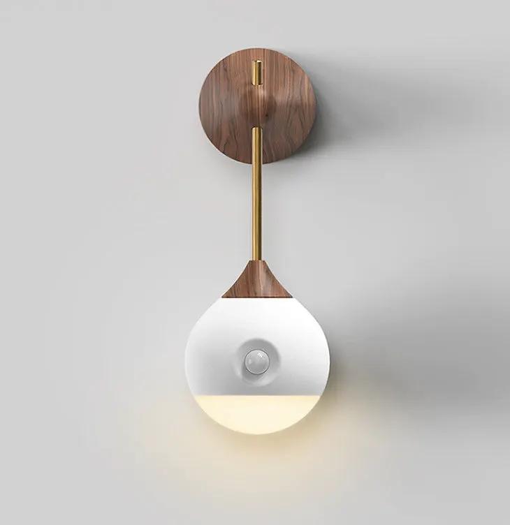 Motion Sensor Night Light wall sconce by Decorbites with wood backplate, brass stem and white globe on Tampa Home & Garden Store
