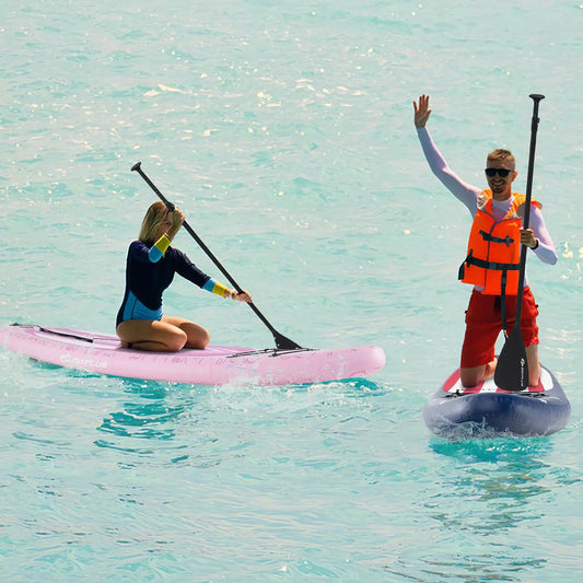Pink inflatable ISUP board with 3 fins and backpack, two paddlers on turquoise water on Tampa Home & Garden Store