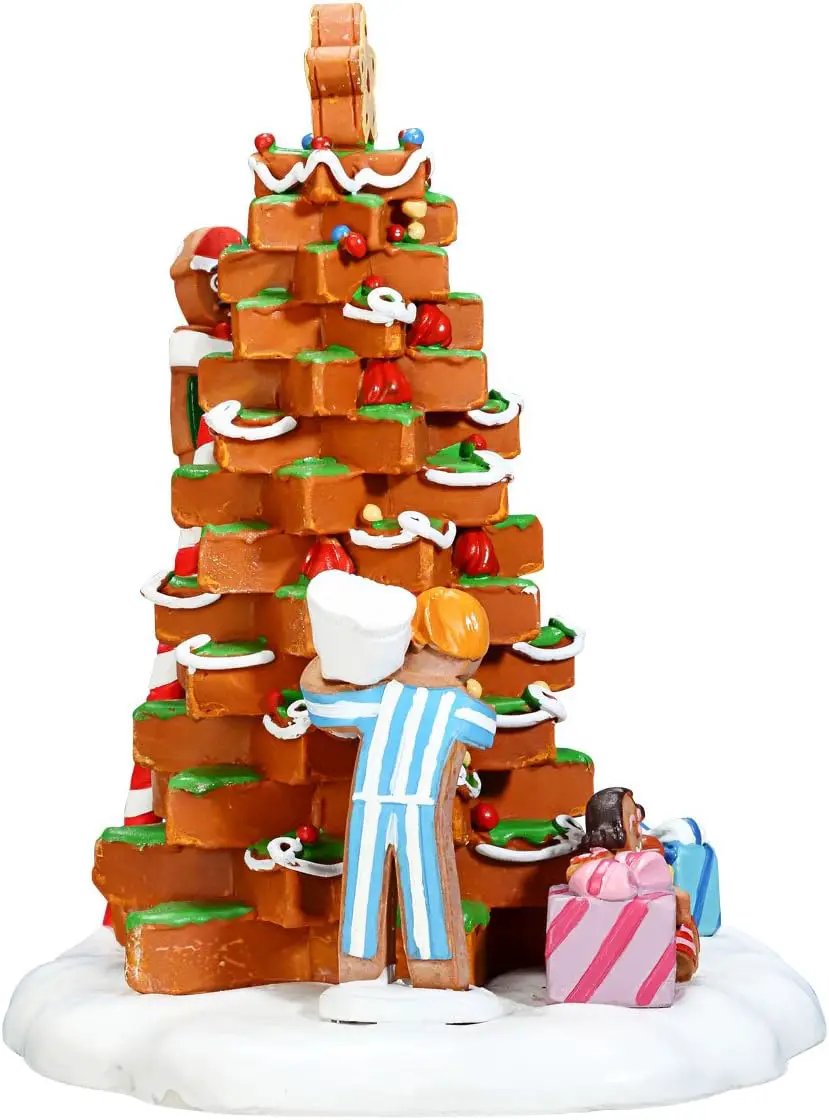 Gingerbread Tree tower with icing baker in blue beside pink gifts on snowy base on Tampa Home & Garden Store