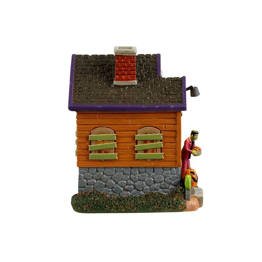 Frank's Treats From the Frankenstein Lab Halloween village orange cabin purple roof shutters on Tampa Home & Garden Store